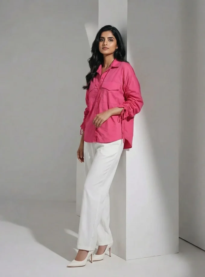 Alora front — model wearing the fuchsia pink drawstring sleeve shirt with chest pocket detailing