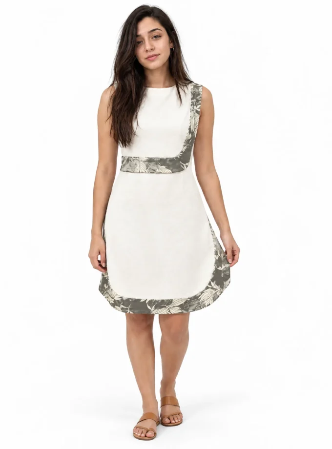 Apricot — model wearing the ivory cotton double layered curve dress with grey floral hem