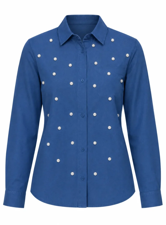 Aster light blue denim shirt shown alone on an invisible mannequin, with rhinestone studs across the chest