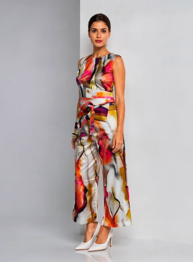 Aura — model wearing the vertical print glaze cotton sleeveless jumpsuit with the belt