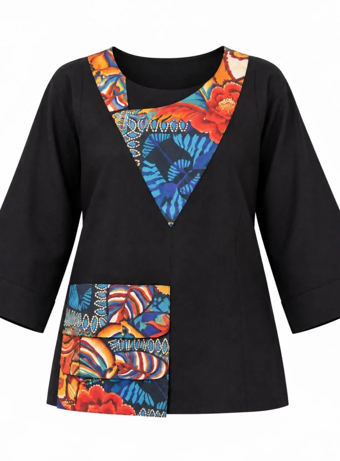 Briar black cotton top with multicolour geometric print V yoke and printed pocket shown alone on an invisible mannequin