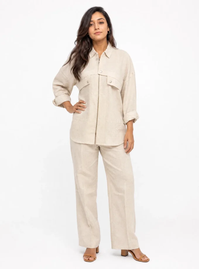 Carina — model wearing the dusty beige linen zipper shirt with the dusty beige linen straight fit pant