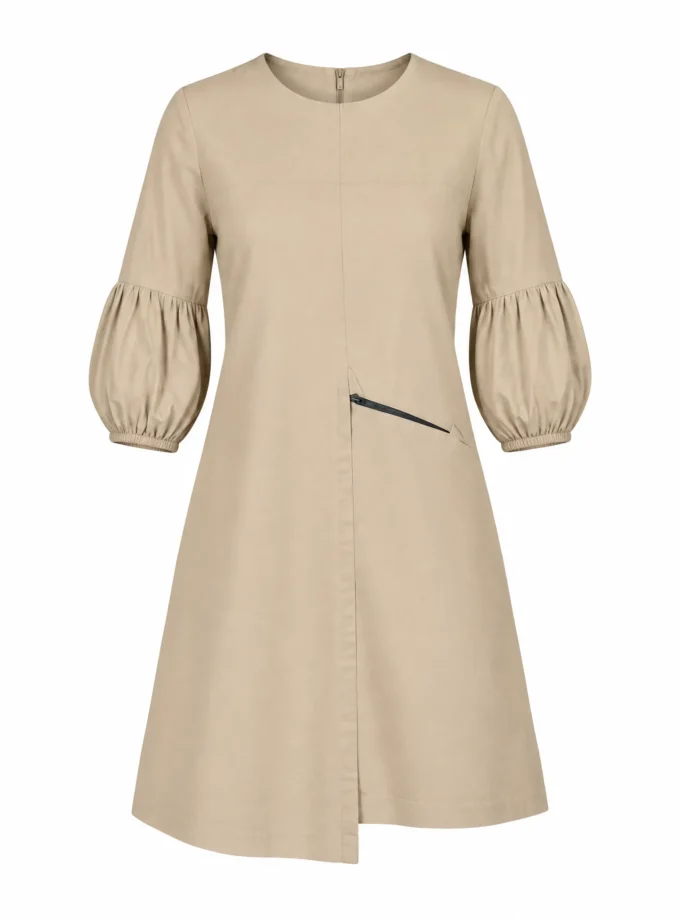Chic beige cotton A line zip dress with puff sleeve hem shown alone on an invisible mannequin