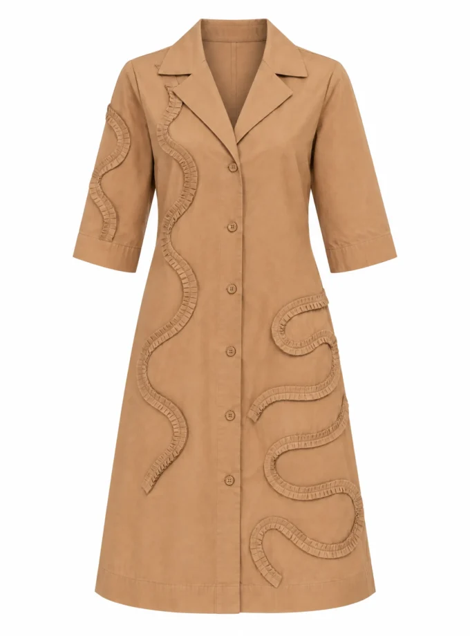 Clarity beige cotton collar lapel A line dress with pleated applique placement shown alone on an invisible mannequin