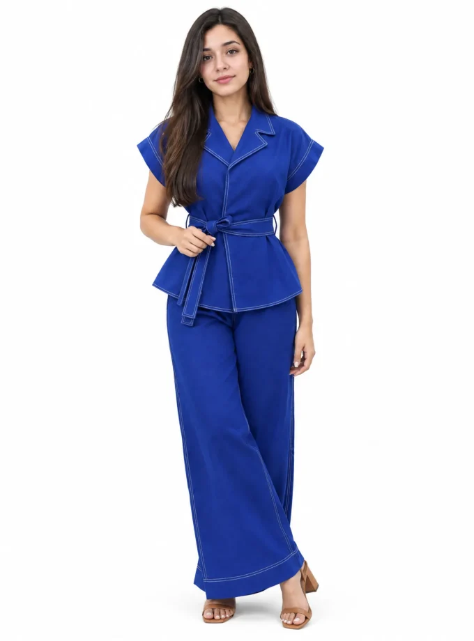 Cobalt — model wearing the cobalt blue overlap collar top with belt and the cobalt cotton straight fit pants with Eryn stitch
