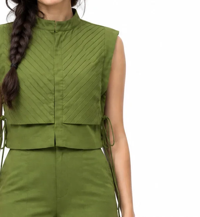 Dahlia military green cotton linen pintucked yoke bib shown alone on a dressform