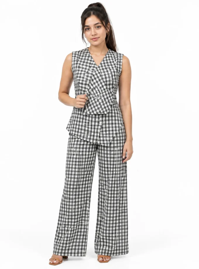 Elina - model wearing the monochrome checkered faux stole sleeveless top and the monochrome checkered straight fit pant