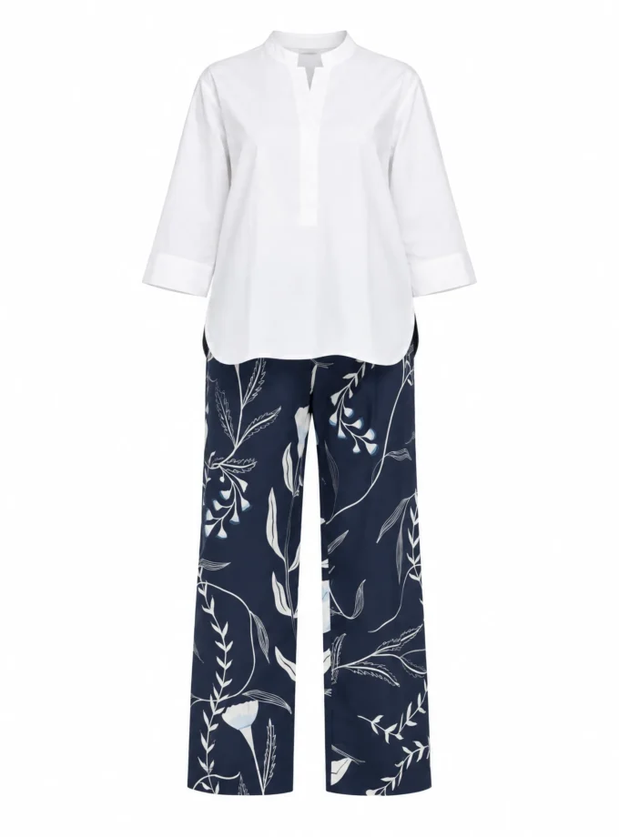 Estelle white cotton mandarin shirt and blu forest print straight fit pants shown together on an invisible mannequin