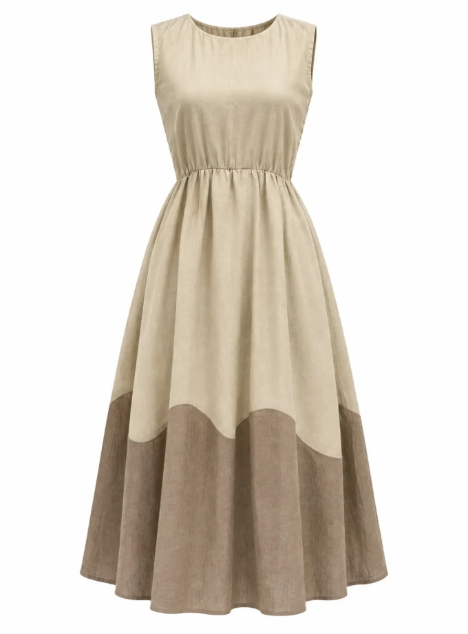 Inez light beige handloom sleeveless dress alone on an invisible mannequin, with a brown scallop edged patch panel at the hem