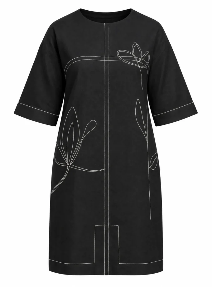 Liana black cotton picture dress with contrast stitch detailing shown alone on an invisible mannequin