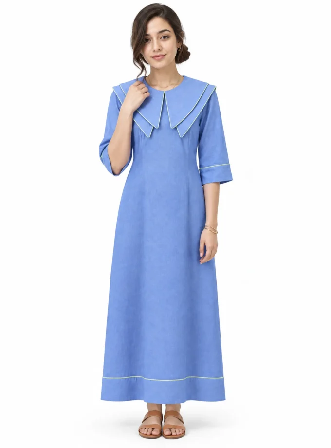 Marcella — model wearing the powder blue cotton linen straight fit dress with elaborate front and back collars