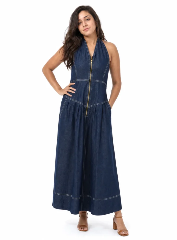 Marina — model wearing the dark denim zip up backless halter neck maxi dress