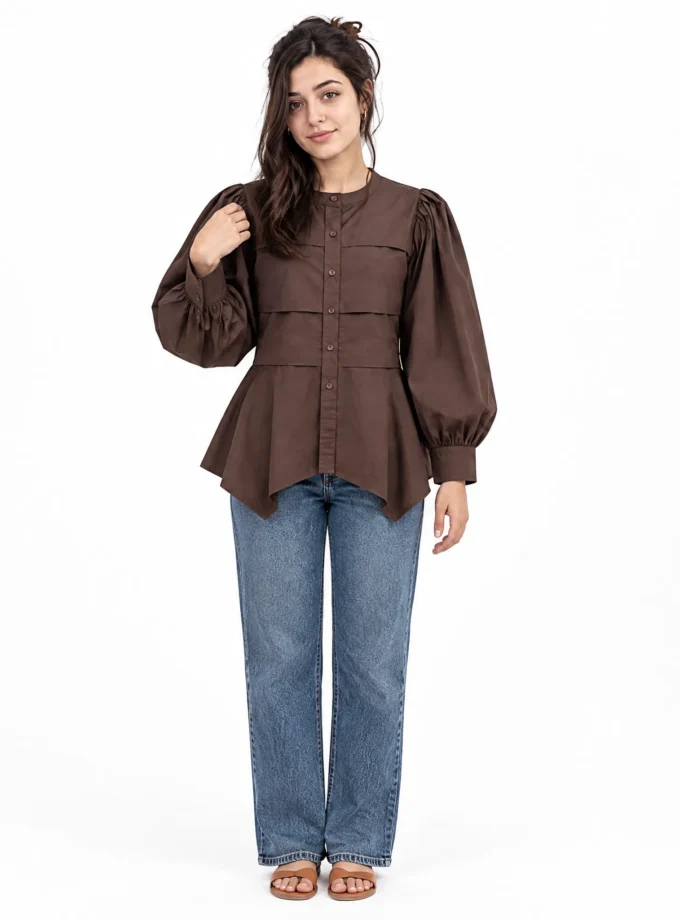 Mist — model wearing the brown coffee cotton closed neck button down flat pleat shirt with balloon sleeves