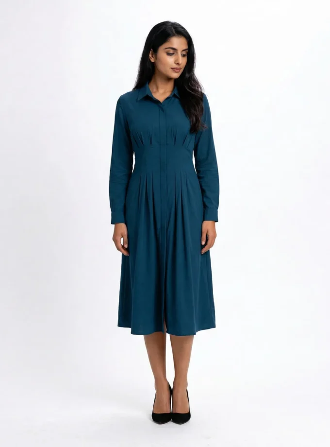 Muse — model wearing the teal cotton cinched waist dress with shirt collar