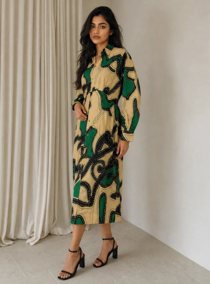 Plume — model wearing the abstract print glaze cotton pleated yoke straight fit dress