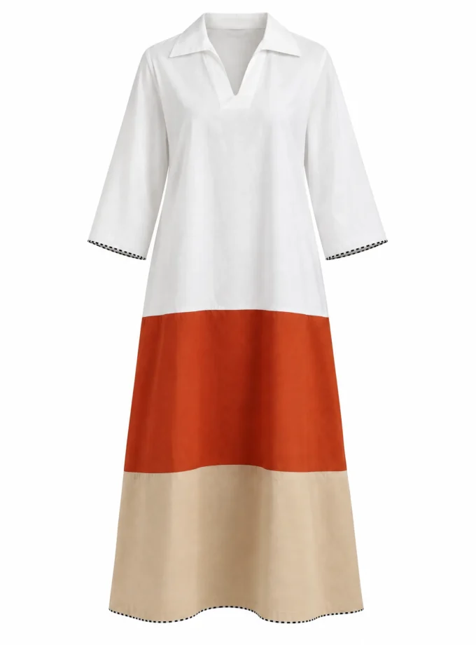 Solstice tri colour cotton A line dress with a collar neck and black and white dashed hem trim shown alone on an invisible mannequin