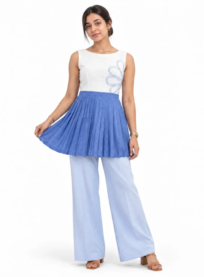 Solene — model wearing the white and blue cotton linen pleated yoke top