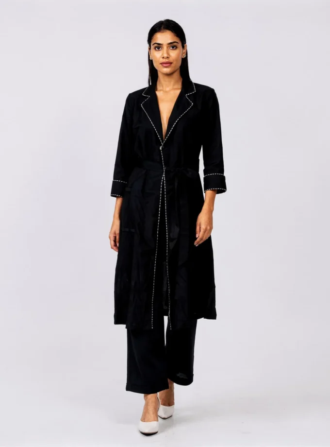 Soraya — model wearing the black h-loom one button jacket with the black h-loom inner and straight fit pant
