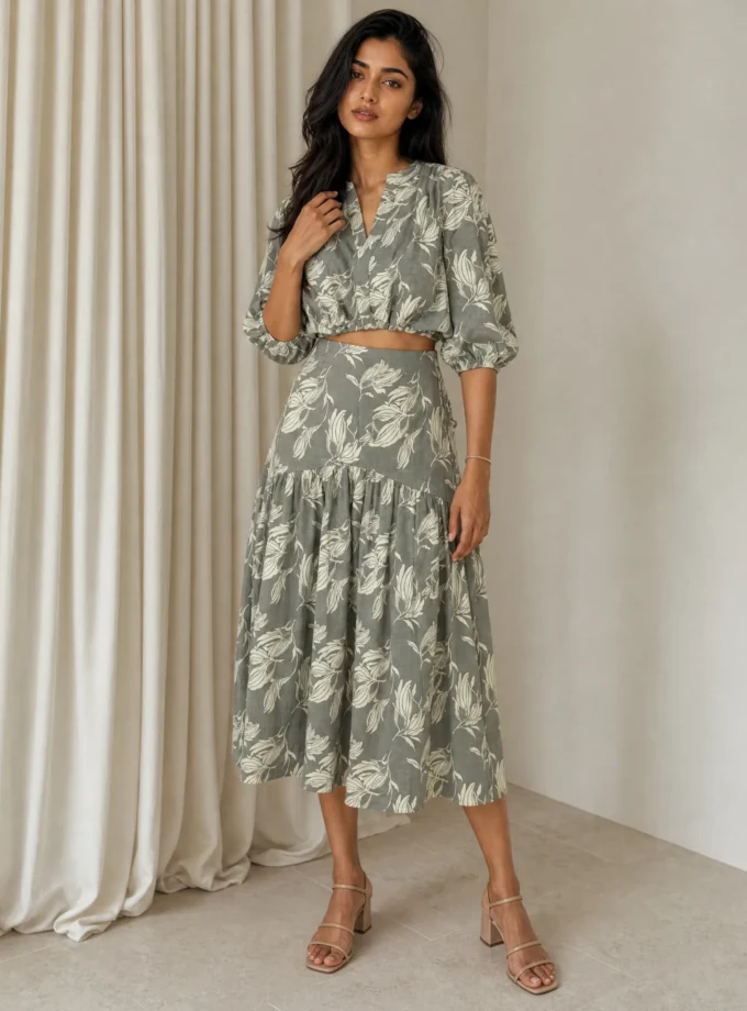 Stone — model wearing the grey floral printed drawstring pull crop top and the grey floral printed corset yoke gathered skirt