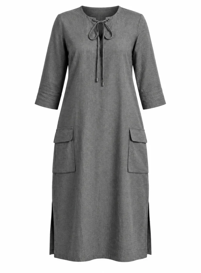 Velvet grey cotton drawstring dress with square pocket detailing shown alone on an invisible mannequin