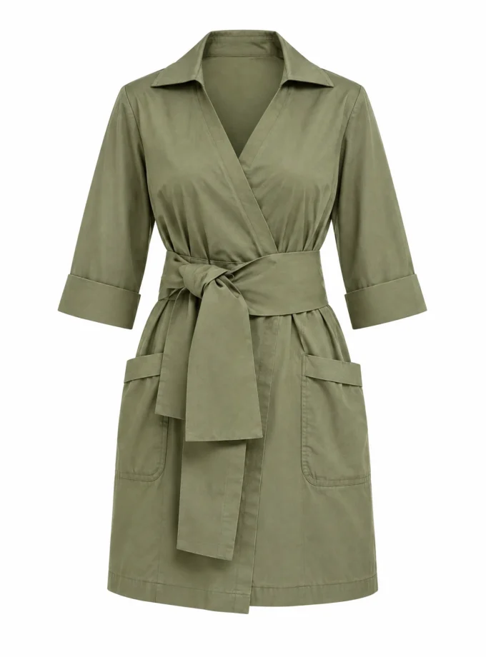 Vivienne mint green gumpa pocket dress with an oversized fabric belt shown alone on an invisible mannequin