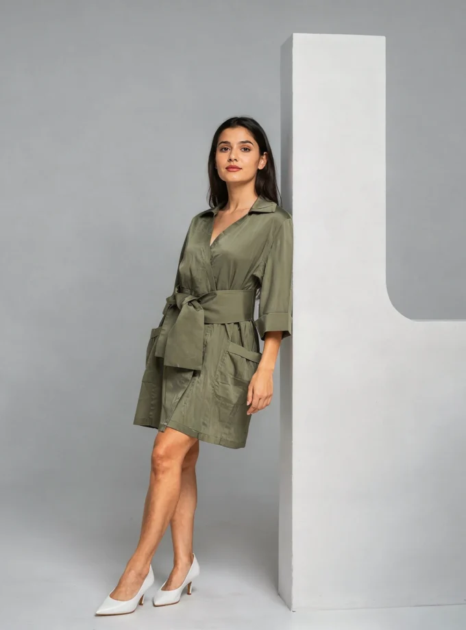 Vivienne — model wearing the mint green gumpa pocket dress with an oversized fabric belt