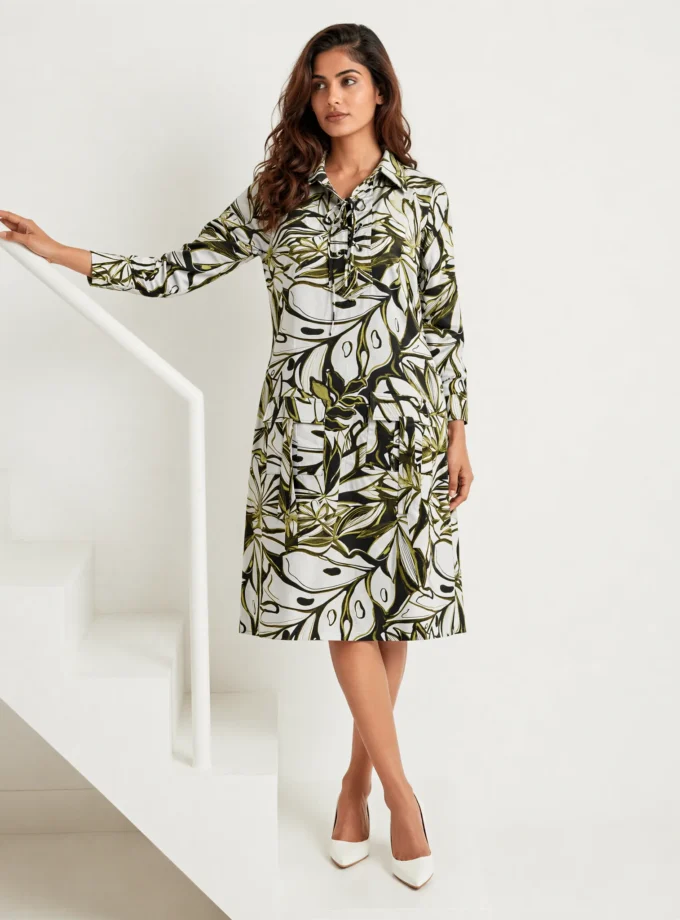 Whisper — model wearing the abstract print glaze cotton drawstring dress with square pocket detailing