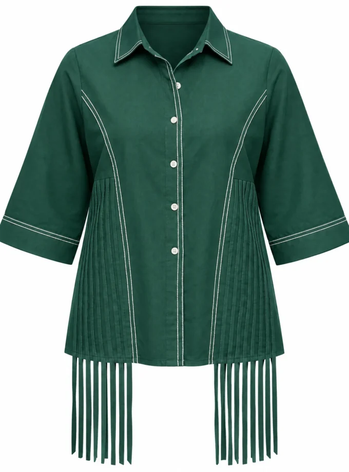 Xenia green denim tassel drop shirt with upturn sleeves and tassel fringe shown alone on an invisible mannequin