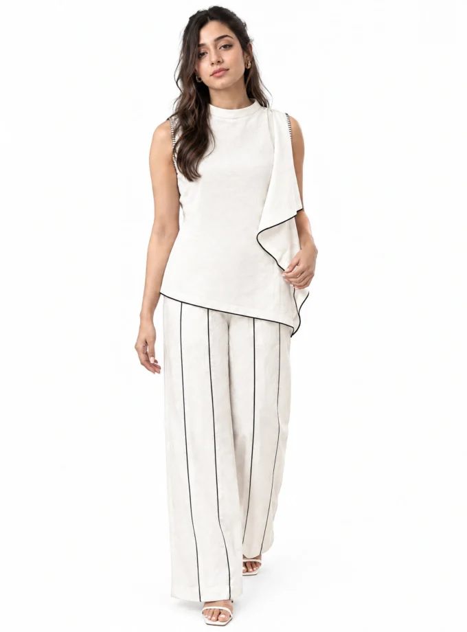 WHITE LINEN BLEND STRAIGHT FIT PANTS WITH BLACK LINE DETAIL, worn by a model