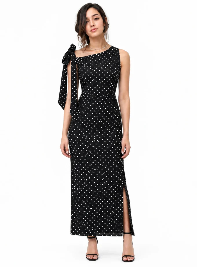 BLACK POLKA DOT STRAIGHT SLEEK DRESS WITH DROP SHOULDER TIE UP AND KNEE HIGH SLIT, worn by a model