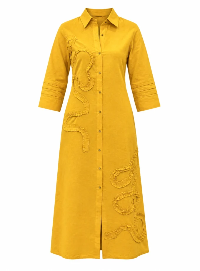 Evarine mango H-loom shirt-collar aline dress with pleated applique placement shown alone on an invisible mannequin