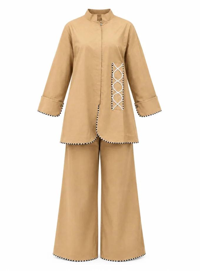 Zoreille biscuit beige cotton mandarin collar high low shirt paired with the biscuit beige cotton trousers, shown together on an invisible mannequin